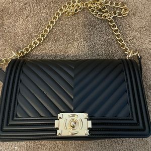Black quilted handbag
